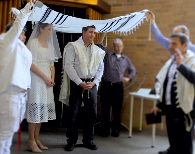 The simplest chuppah is to have four friends each hold up a corner of a large tallit. The downside of this, is those holding up the tallit can only do so for about 10 minutes, before their arms feel very tired. The heads of the bride and groom may touch the tallit as it is likely to droop jin the middle. 